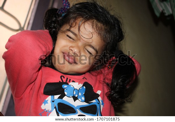 Indian girl yawning. Ranchi jharkhand India. 14\
February 2020
