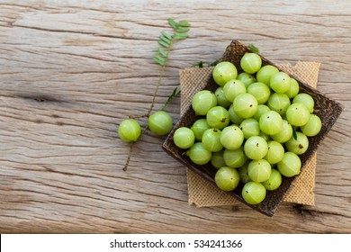 Indian Gooseberry On A Wooden Floor