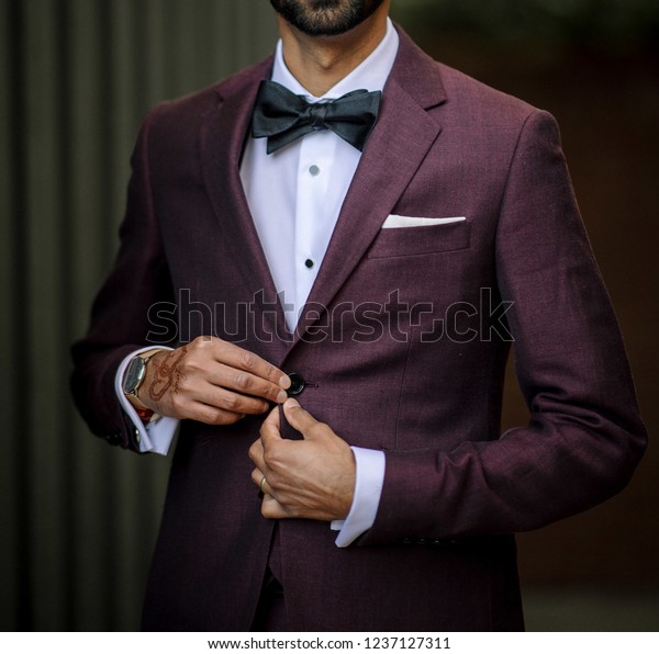 reception costume for groom