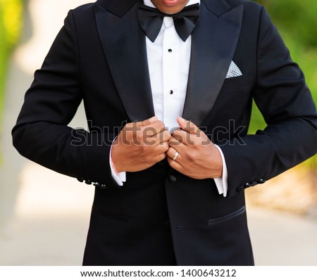 Indian groom's Showing bowtie and dress
