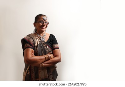 Indian Gujarati Old Lady In Her Traditional  Black Saree And Ornament.