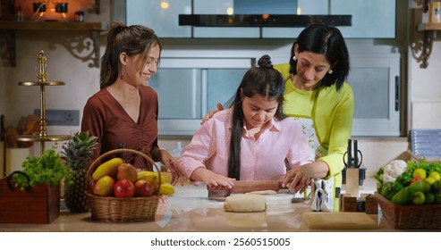 Indian happy mother with cute daughter rolling raw dough together teach baking cookies in modern kitchen house. Carefree young adult mom girl kid child learn cooking homemade bakery food indoor home - Powered by Shutterstock