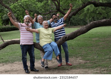 Indian happy son with true friends fully enjoying in garden - Powered by Shutterstock