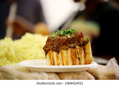 An Indian Inspired Curry And Bread Fast Food Meal Known As A Bunny Chow In South Africa