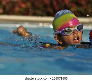 Indian Kid In The Swimming Pool