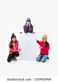 Indian Kids In Warm Clothes Holding White Board, Indian Winter Fashion