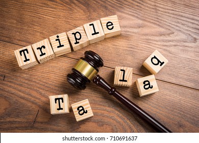 Indian Law On Triple Talaq Or Divorce Showing Wooden Gavel And Alphabate Written Over Wooden Block