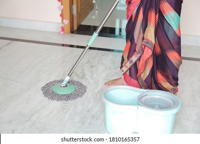 Indian Maid Mopping Floor At Home, House Hygiene And Cleaning Service Concept.