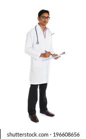 Indian Male Doctor Full Body Writing On Board Isolated On White