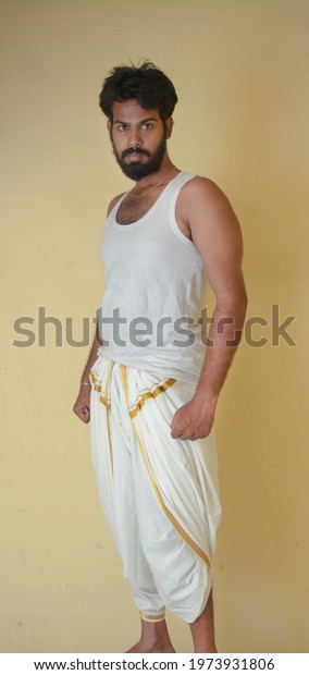 Indian Male Model\
Wearing Dhoti and Vest