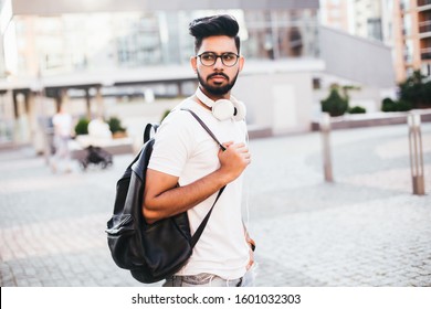 Indian Male Student Iwith Bag In The Street