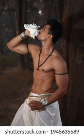 Indian Man Blowing Conch Shell