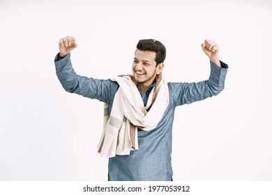 Indian man dancing cheerfully on white backgound