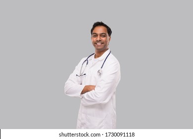 Indian Man Doctor Smiling Hands Crossed Isolated. Healthy Life, Medicine Concept.