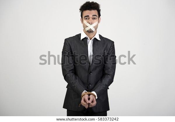 [Image: indian-man-hands-tied-mouth-600w-583373242.jpg]