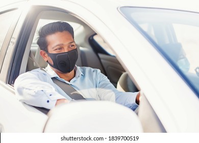 Indian Man In Protective Face Mask Driving A Car During Coronavirus Pandemic In India