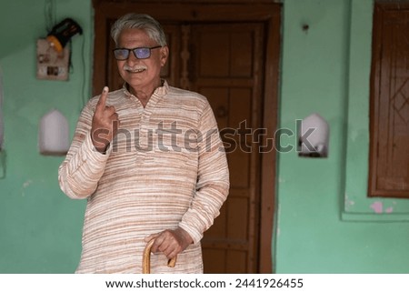 indian man showing finger after voting. voting sign in india. Concept of Right to vote.