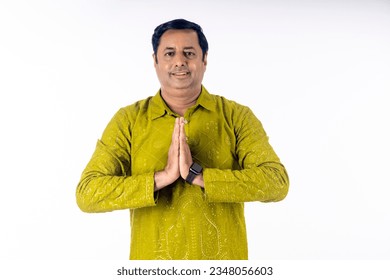 Indian man Showing Namaste or welcome gesture, on White Background.