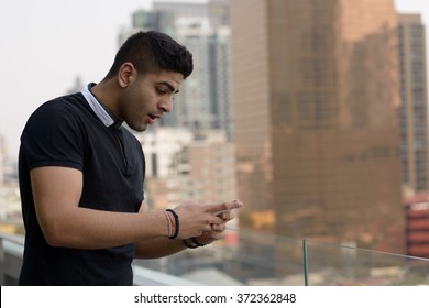 Indian Man Using Mobile Phone