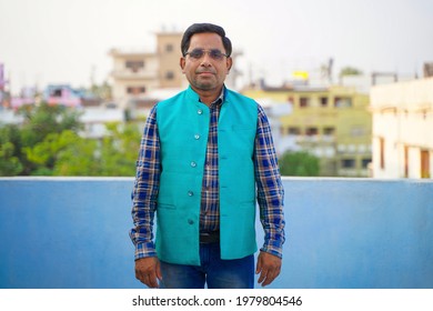 An Indian man wearing glasses, A successful businessman. - Shutterstock ID 1979804546