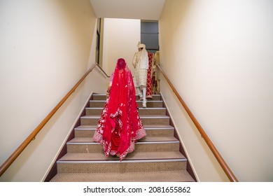 Indian Married Couple Wearing Wedding Outfit Full Size Back View