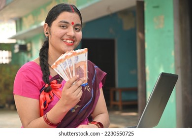 An Indian married woman using laptop  - Shutterstock ID 2230550725