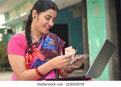 An Indian married woman using laptop  - Shutterstock ID 2230550729