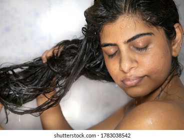 Indian Mexican Lady Bathing  Hair Wash Her Hairs Massaging Hair And Body With Hands Visible Soap Lather Water Dripping From Her Nude Body Posing With Smiling Face Posing Her Long Black Hairs In Corona