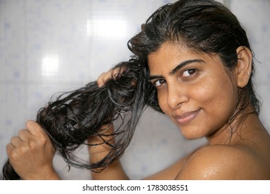 Indian Mexican Lady Bathing  Hair Wash Her Hairs Massaging Hair And Body With Hands Visible Soap Lather Water Dripping From Her Nude Body Posing With Smiling Face Posing Her Long Black Hairs In Corona