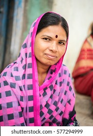 Indian mid-age lady closeup with traditional saree in rural village Salunkwadi, Ambajogai, Maharashtra, India, Southeast, Asia