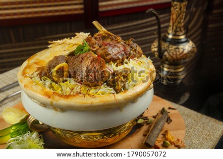 Indian Mutton Biryani with aroma, spices and meat 