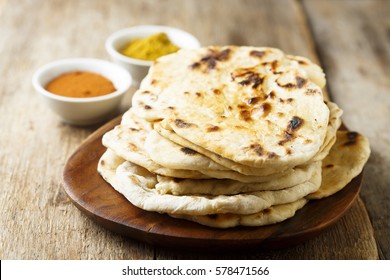 Indian Naan Bread On Wooden Desk