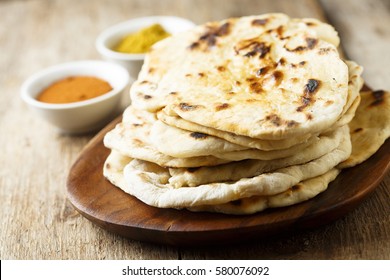 Indian Naan Bread On Wooden Desk