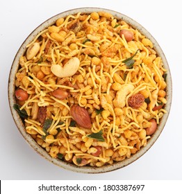 Indian Namkeen Snacks served in ceramic bowl & plate or Indian traditional Namkeen Food Mixture or Navratna Mix Namkeen Also Know as Nimco, Namkin, Mixture ,chiwda or Nimko

 - Shutterstock ID 1803387697