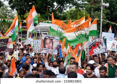 Indian National Congress Activist Hold Congress Flag And Poster During A Protest Against State And Union Government On September 12, 2019 In Calcutta, India.