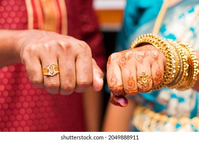 Indian Newlyweds Bride Groom Showing Their Engagement Rings.