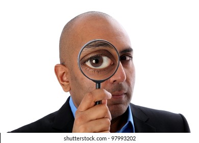 Indian o african Man with magnifying glass - Shutterstock ID 97993202