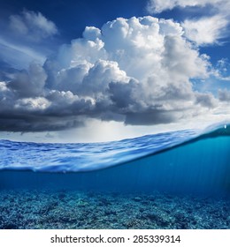 Indian Ocean Half Water Shoot With Cloudy Sky And Underwater World Discovered