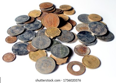 Indian Old vintage coins. Indian old and new coins isolated on white background.  Valid and invalid Indian currencies. Old Indian Currency old Coin - GEORGE VI KING EMPEROR picture highlighted.
