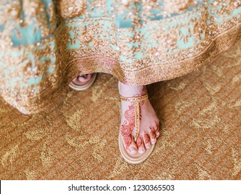 Indian Pakistani Bride Showing Mehndi Design On Her Foot Sandals Shoes