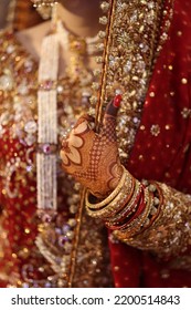 Indian Pakistani Bride's Henna Hand Holding Her Veil, Selective Focus, A Little Bit Of Depth Of Field