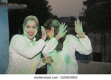 Indian People Happily Playing Holi Festival With Friends And Family