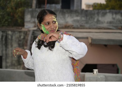 Indian People Happily Playing Holi Festival With Friends And Family