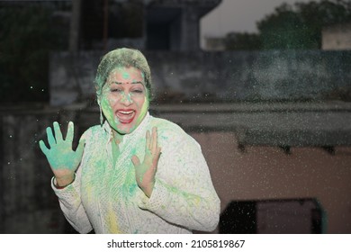 Indian People Happily Playing Holi Festival With Friends And Family