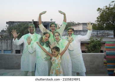 Indian People Happily Playing Holi Festival With Friends And Family