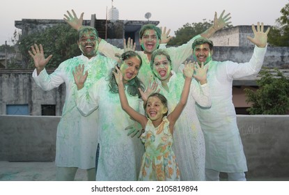 Indian People Happily Playing Holi Festival With Friends And Family