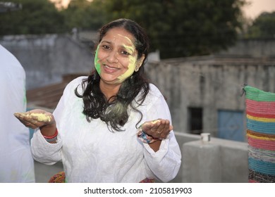 Indian People Happily Playing Holi Festival With Friends And Family