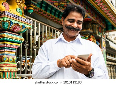 Indian People Using Mobile Phone