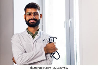 Indian Pet Doctor Wearing Uniform And Holding A Stethoscope