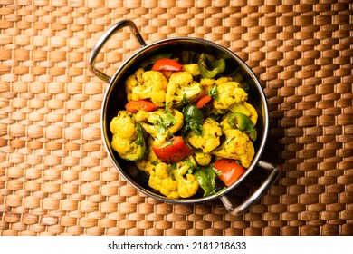 Indian Phool Gobi Shimla Mirch Sabji Recipe Or Capsicum Cauliflower Sabzi  - a Healthy And Homemade Dry Vegetable Dish.